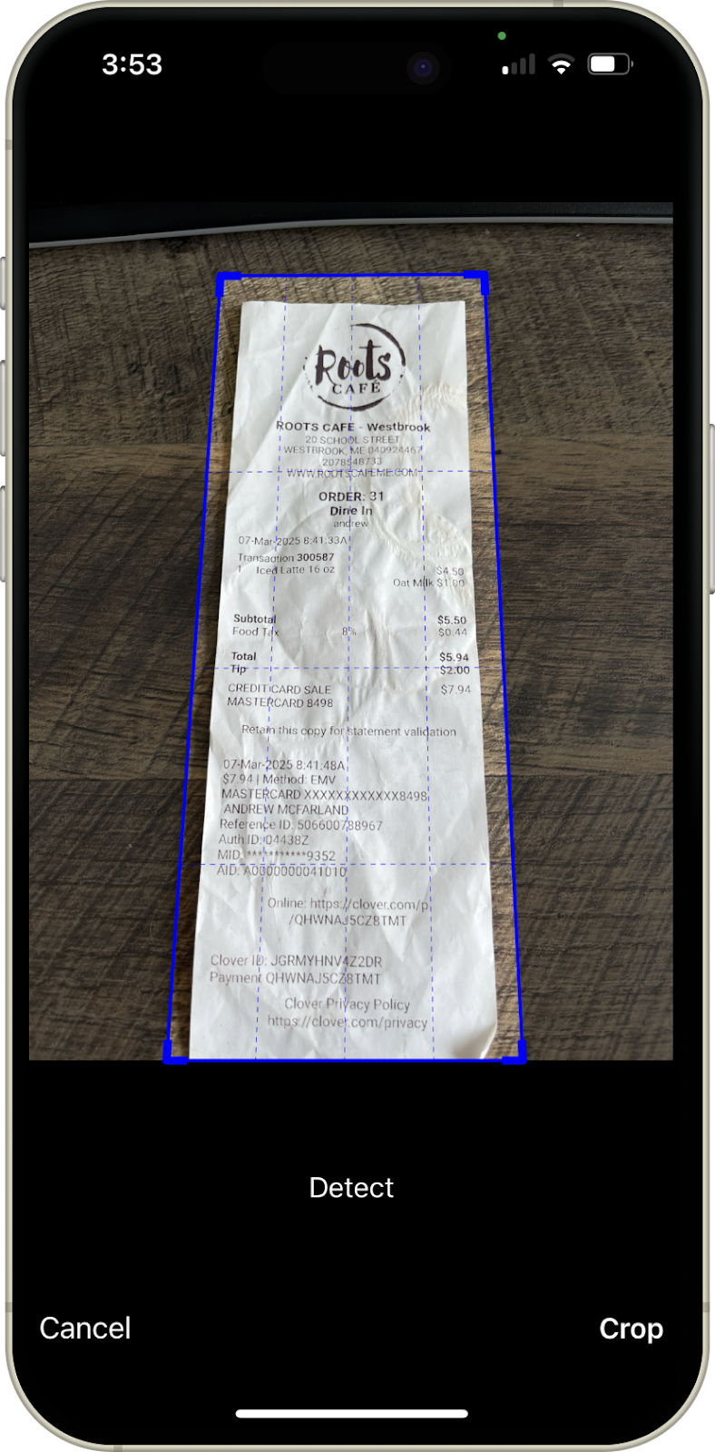 Receipt photo automatically cropped to remove background clutter in Emburse Mobile